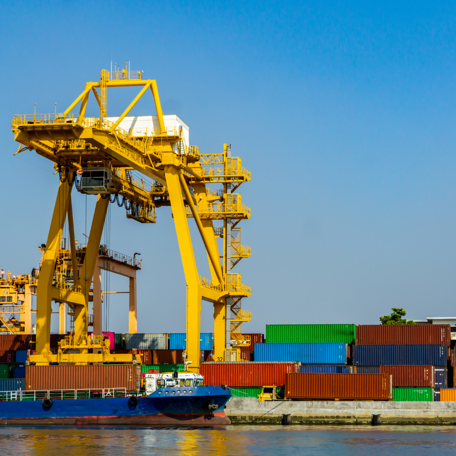 Shipping port with cargo containers and cranes, symbolizing the future of global natural gas trade.